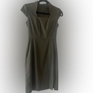 Step out in style with this beautiful Antonio Melanie olive cap sleeve dress!